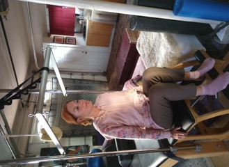 Private Pilates practice on a Chair