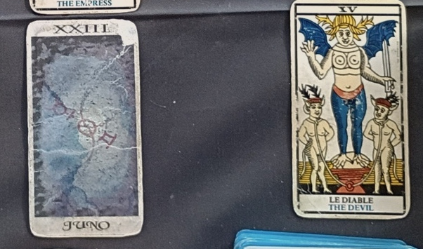 Juno and Devil within their original positions in the full spread