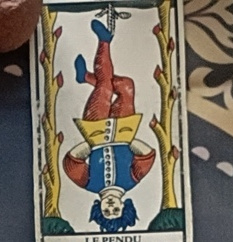 Hanged Man, original card at top of the right-hand column